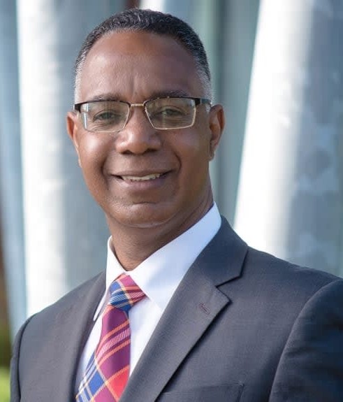 Dr. Gervan Fearon Table